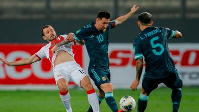 Peru's Horacio Calcaterra, left, and Argentina's Lionel Messi vie for the ball. AFP