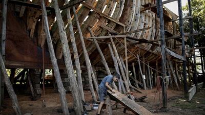 A man works on a sailing ship which is built at a green shipyard in Puntarenas province, Costa Rica. EPA