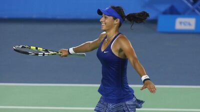 Caroline Garcia of France reacts during her win over Venus Williams at the Wuhan Open in the first round on Sunday. On Monday she advanced again with a second-round win over Agnieszka Radwanska. Hong Wu / Getty Images / September 21, 2014