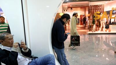 Retailers at the country’s many malls may well be interested in the mystery shopper app service. Fatima Al Marzooqi / The National