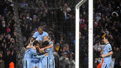 Frank Lampard, second from left, celebrates with his Manchester City teammates after scoring the winning goal during their Premier League match against Sunderland at Etihad Stadium in Manchester on Thursday. David Richards / EPA