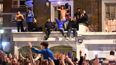 Chelsea supporters celebrate in streets surrounding their Stamford Bridge stadium in London their Champions League victory. PA