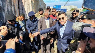 Prime Minister of Libya's UN-recognised Government of National Accord (GNA) Fayez al-Sarraj visits the port in the capital Tripoli after it was hit by rocket fire. AFP / Mahmud TURKIA