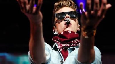 Justin Bieber has an army of dedicated followers in the palm of his hand. Reuters / Tami Chappell