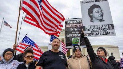 Several demonstrators gathered near the Capitol, including Micki Witthoeft, centre, the mother of Ashli Babbitt, who was killed by police during the insurrenction. Getty / AFP