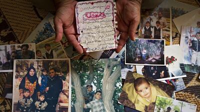 Fayez Salha holds a hand-written letter from his dead son Dia El Din. Mr Salha, 51, lost four children, his wife and her sister in an Israeli airstrike on his home in northern Gaza on January 8, 2009. Heidi Levine for The National