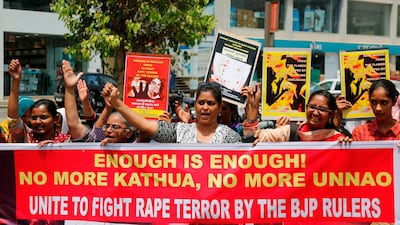 Indian women shout slogans during a protest against recent incidents of rape, in Ahmadabad, India, on April 13, 2018. Ajit Solanki / AP Photo
