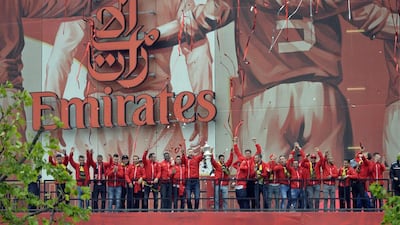 Arsenal celebrate during the parade. Reuters / Adam Holt