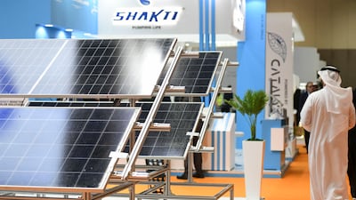 Solar panels on display at Abu Dhabi Sustainability Week in January. Khushnum Bhandari / The National