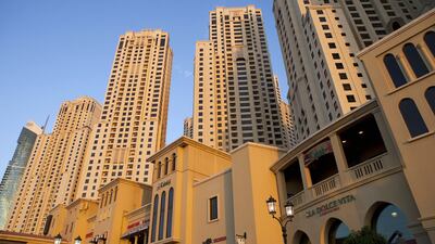 Dubai apartment prices remained flat for a second consecutive quarter as buyers continued to be put off by the introduction of mortgage caps by the Central Bank and a hike in transfer fees. Razan Alzayani / The National