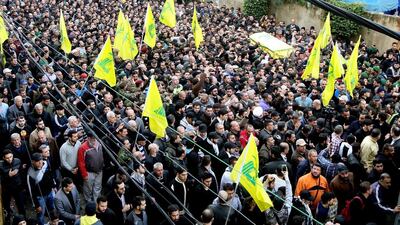 Supporters of Hezbollah carry the coffin of Jihad Imad Mughniyeh, son of late Hezbollah leader Imad Mughniyeh, during his funeral, in a suburb of Beirut. Nabil Mounzer / EPA