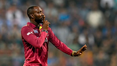 West Indies' Kesrick Williams celebrates after taking the wicket of Rohit Sharma at the Wankhede Stadium in Mumbai. AFP