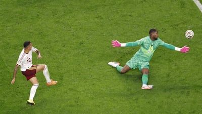 Spain's Pedro Porro finishes past France goalkeeper Mike Magnon to make it 2-0. EPA
