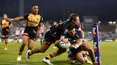 ACT Brumbies' Tom Wright scores a try during the Super Rugby AU semi-final against Western Force at the GIO Stadium in Canberra , on Saturday, May 1. Getty