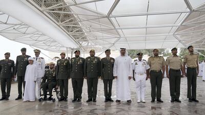 Sheikh Mohammed bin Zayed, Crown Prince of Abu Dhabi and Deputy Supreme Commander of the UAE Armed Forces, stands for a photograph with members of the UAE Armed Forces who served in Yemen, during a Sea Palace barza. Seen with Lt General Hamad Thani Al Romaithi, Chief of Staff UAE Armed Forces (9th L), Sheikh Zayed bin Hamdan bin Zayed (5th L), Sheikh Saeed bin Hamdan bin Mohammed, (4th L) Sheikh Rashid bin Hamdan bin Zayed (3rd L) and Brigadier General Saleh Mohammed Saleh Al Ameri, Commander of the UAE Ground Forces (2nd L). ( Mohamed Al Hammadi / Crown Prince Court - Abu Dhabi ) ---
