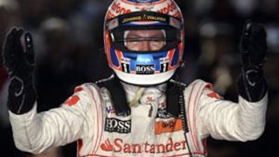 Jenson Button celebrates after winning the Australian Grand Prix in Melbourne on Sunday, his first for McLaren-Mercedes.