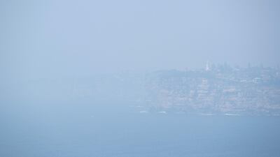 SSouth Head is hidden by smoke. Getty Images