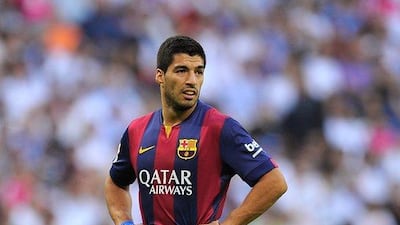 Luis Suarez of Barcelona looks on during his side's 3-1 La Liga loss to Real Madrid on Saturday at the Santiago Bernabeu in Madrid. Denis Doyle / Getty Images / October 25, 2014