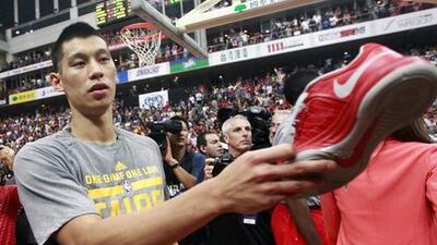 Jeremy Lin, the first Asian-American to win an NBA championship, now plays basketball in China, where the league is waiting to start after the coronavirus pandemic. AFP