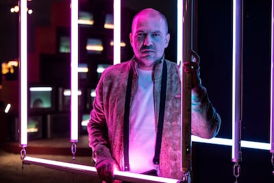 Mikhail Antykov with his artwork Colour of Shadow. Antonie Robertson/The National