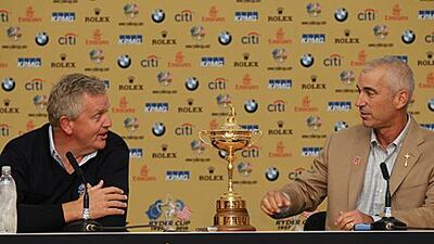 Colin Montgomerie, left, the captain of Europe and Corey Pavin, the USA captain , are pictured with the Ryder Cup between them. Andrew Redington / Getty Images
