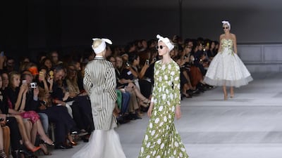 A model presents a creation by Giambattista Valli during the 2014/2015 Haute Couture Fall-Winter collection fashion show on July 7, 2014 in Paris. AFP PHOTO / MIGUEL MEDINA