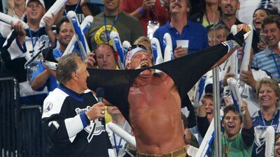 Hockey Hall of Fame star Phil Esposito, left, with Hulk Hogan at the NHL Stanley Cup Finals in 2004. Getty Images