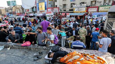 An Iraqi protester sleeps during an anti-government demonstration in the capital Baghdad's Tahrir Square. AFP