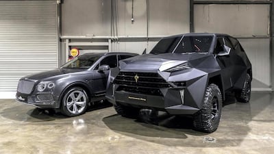 The six-tonne Karlmann King, pictured next to a Bentley Bentayga for scale, at Car Vault. Antonie Robertson / The National