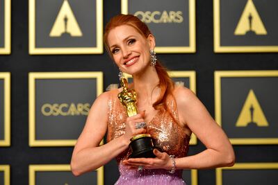 US actress Jessica Chastain poses with the award for Best Actress in a Leading Role. AFP