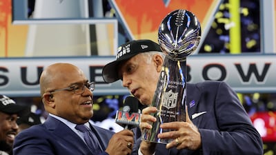 Los Angeles Rams owner Stan Kroenke speaks with the media as he holds the Vince Lombardi Trophy. Reuters