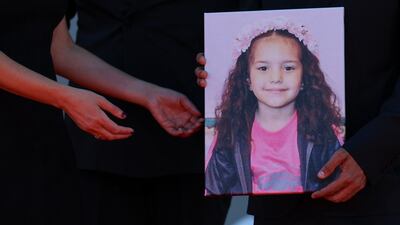 A picture of Hind Rajab held during the screening of "The Voice of Hind Rajab" , at the Venice Film Festival, on September 3. Reuters