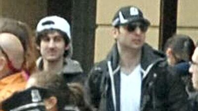 The suspect in the white cap has been named as Dzhokar Tsarnaev, according to reports. The other suspect, Dzhokar Tsarnaev's brother, in the Boston Marathon bombings has been killed.