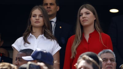 Princess Leonor of Spain, left, and Infanta Sofia of Spain watch the closing ceremony. EPA