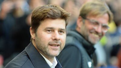 Tottenham manager Mauricio Pochettino smiles before the match against Liverpool at Wembley. Gerry Penny / EPA