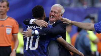 Kylian Mbappe of France celebrates with Didier Deschamps after scoring the 1-0 goal during the match France against Sweden, in New Jersey. EPA