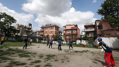 Cricketers practice at the Baluwatar Cricket Club training centre in Kathmandu, Nepal. Pawan Singh / The National