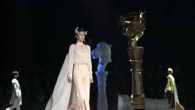 Billowing capes and tailored trousers at the Heaven Gaia collection show by Chinese designer Xiong Ying. Getty Images
