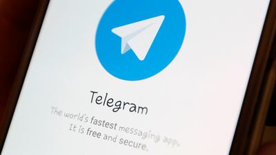 The Telegram logo is seen on a screen of a smartphone. A Moscow court ordered telecommunications companies to block Telegram in Russia. Ilya Naymushin / Reuters