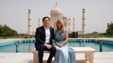 US Secretary of State Marco Rubio poses with his wife, Jeanette, on a visit to the Taj Mahal in Agra, India. Reuters