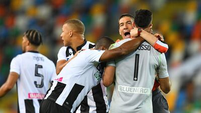 Udinese players celebrate their victory over Juventus. Getty