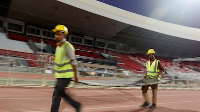 Workers prepare for the papal visit.