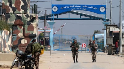 Hamas security forces stand guard at Erez border crossing into Israel, in Beit Hanoun, in the northern Gaza Strip on March 26, 2017, after it was shut by Hamas which blames the Jewish state for the assassination of one of its officials Mazen Faqha in the Palestinian enclave. Mahmud Hams/AFP