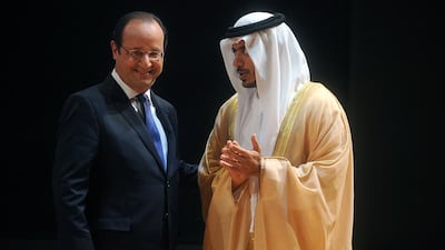 Sheikh Sultan bin Tahnoon, chairman of the Abu Dhabi Tourism and Culture Authority with the French president, Francois Hollande, during the inauguration of the Birth of a Museum exhibition in April. Antoine Antoniol for The National