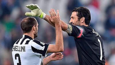 Juventus defender Giorgio Chiellini, left, celebrates with his teammate Gianluigi Buffon at the of the Italian Serie A soccer match between Juventus and Cesena at Juventus Stadium in Turin, Italy, 24 September 2014. EPA/ALESSANDRO DI MARCO