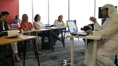 Nasif Kayed, of Sheikh Mohammed bin Rashid Centre for Cultural Understanding, talked about etiquette during the month of Ramadan and answered questions posed by non-Muslims at the Eton Institute in Abu Dhabi. Asmaa Al Hameli / The National