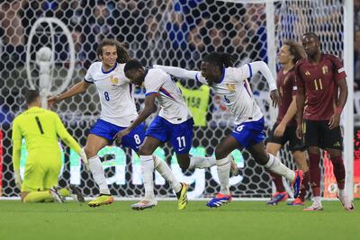 Ousmane Dembele, centre, scored France's second goal against Belgium. EPA