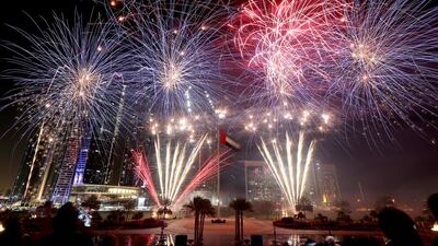 Fireworks light up the skies near Emirates Palace on New Year’s Eve in Abu Dhabi. Sammy Dallal / The National