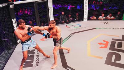 Ali Taleb lands a right hand on Nawras Abzakh.