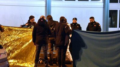 Italian police cordon off an area around a body after a shoot-out between police and a man in Milan’s Sesto San Giovanni neighbourhood. Italy’s interior minister Marco Minniti says the man killed is “without a shadow of doubt” the suspected Berlin Christmas market attacker Anis Amri. Daniele Bennati / Associated Press